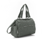 Green CROSSLAND quilted duffel bag with black handles, detachable shoulder strap, and multiple silver zippered pockets, shown against a white background.