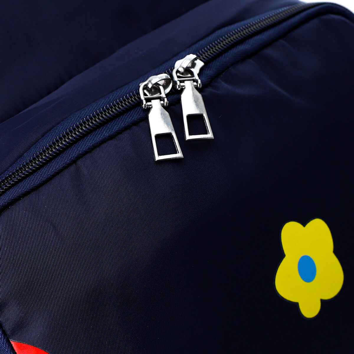 Navy Blue backpack with colorful flower designs