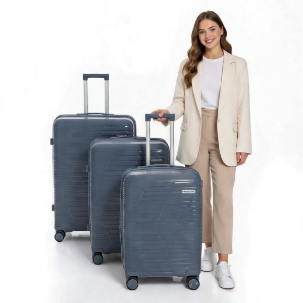 woman with three stylish suitcases.